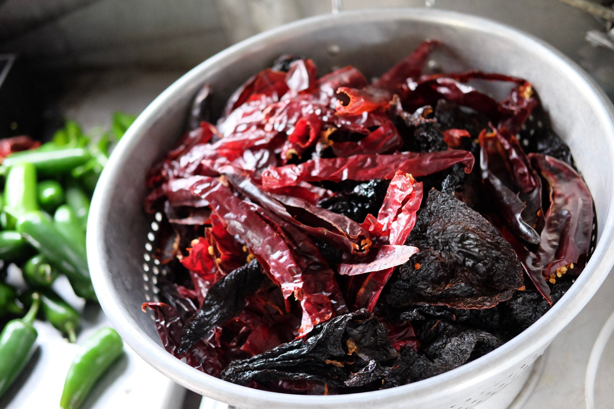 Award-winning Texas red chili catering by Chili Queens of San Antonio, featuring handmade chili, tamales, slushies, and cultural street food.