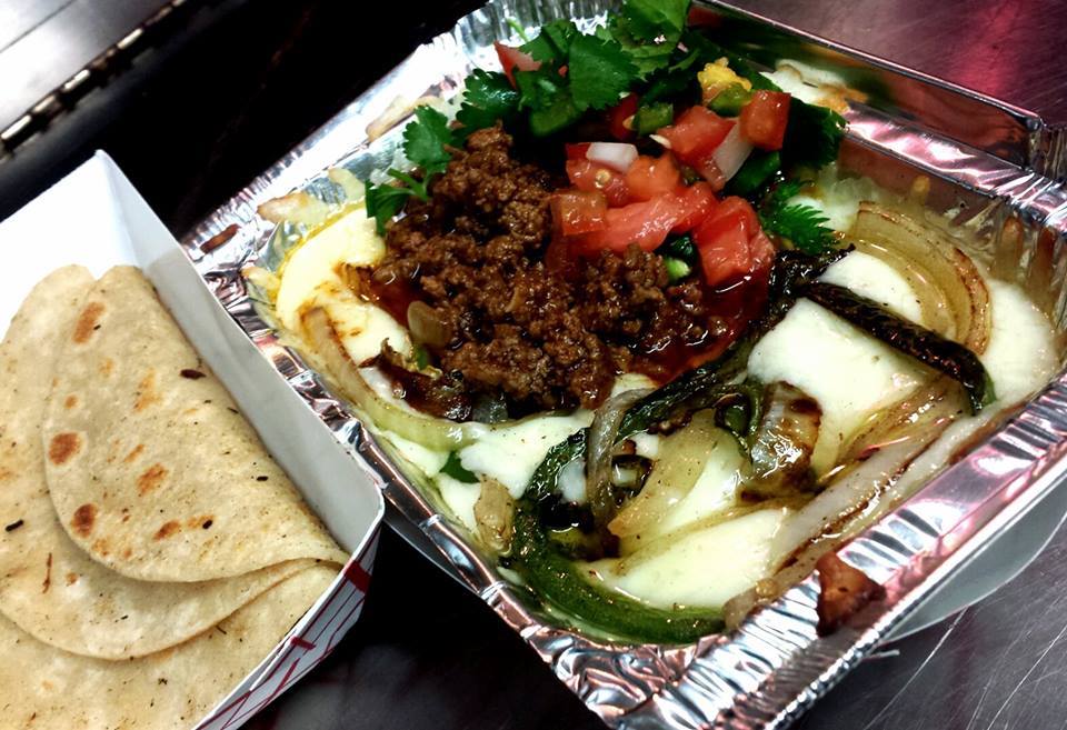 Award-winning Texas red chili catering by Chili Queens of San Antonio, featuring handmade chili, tamales, slushies, and cultural street food.